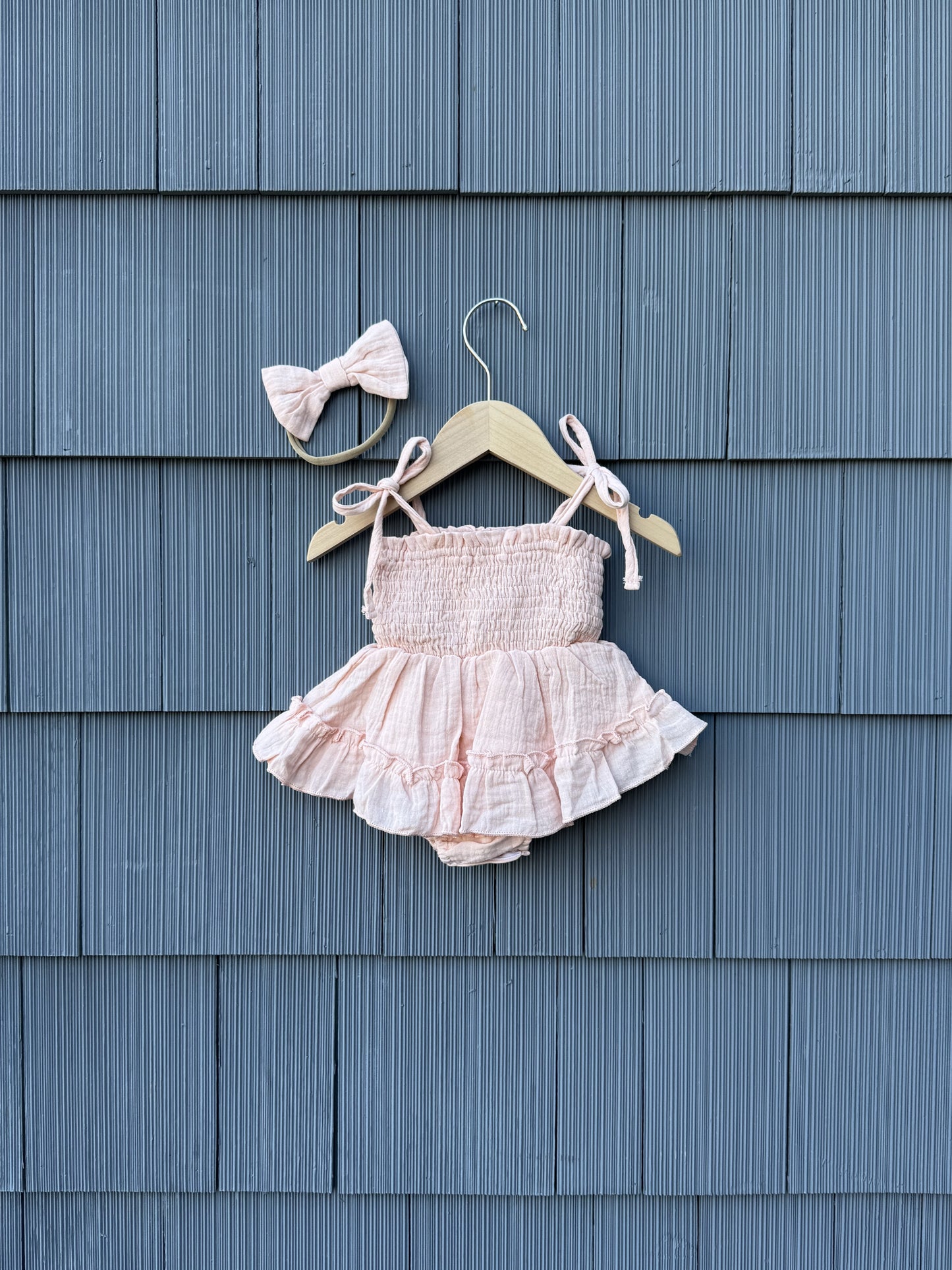Ruby ruched romper & bow