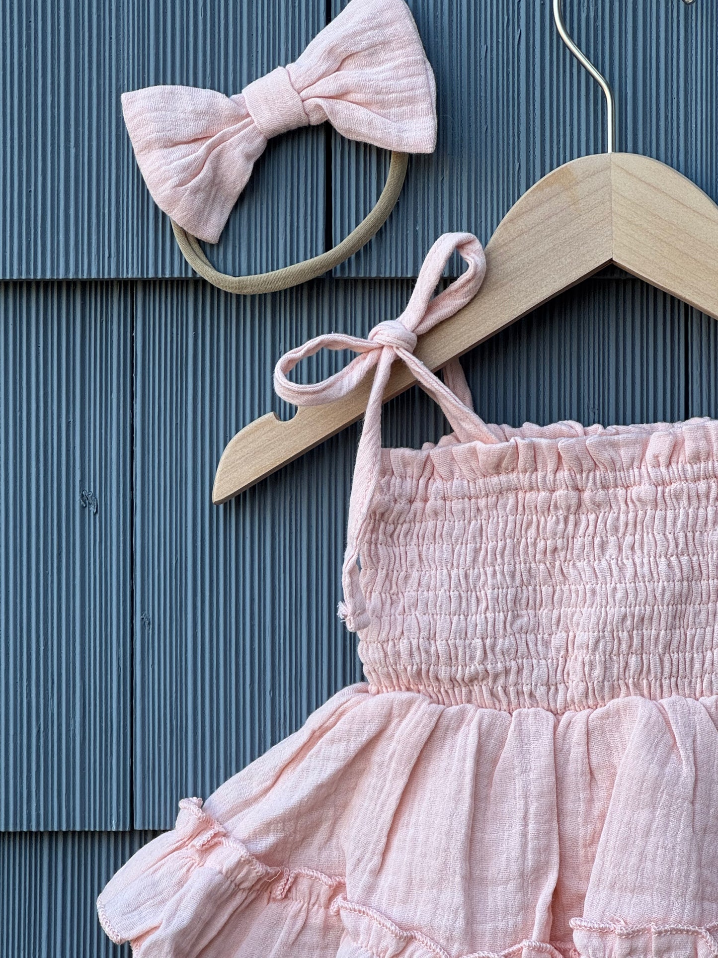 Ruby ruched romper & bow