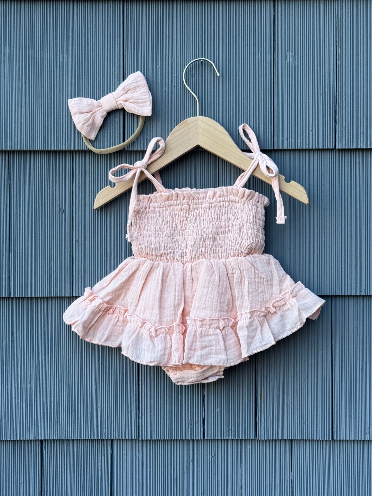 Ruby ruched romper & bow